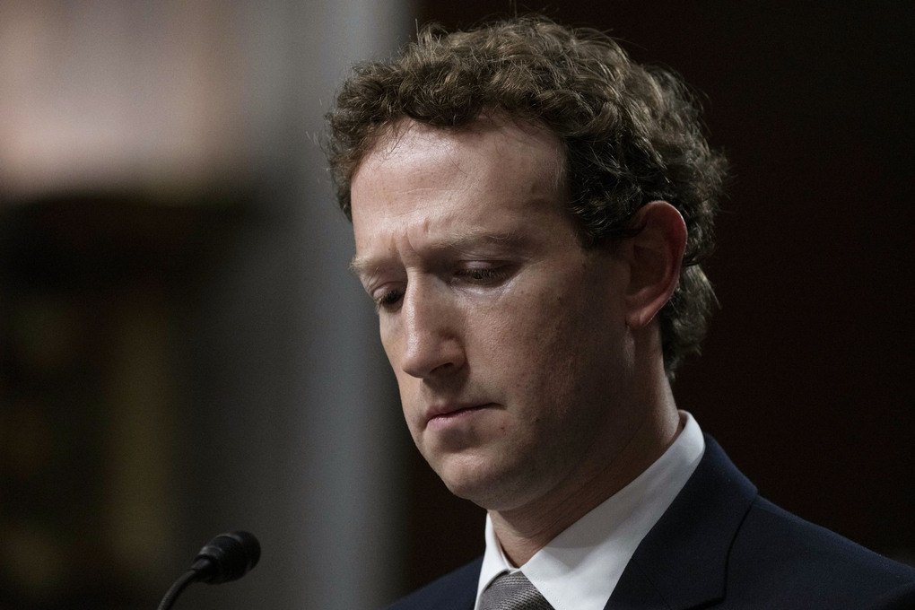 Meta CEO Mark Zuckerberg, looks down as he listens to ranking member Sen. Lindsey Graham, R-S.C., give his opening statement during a Senate Judiciary Committee hearing on Capitol Hill in Washington, Wednesday, Jan. 31, 2024, on child safety. (AP Photo/Manuel Balce Ceneta)